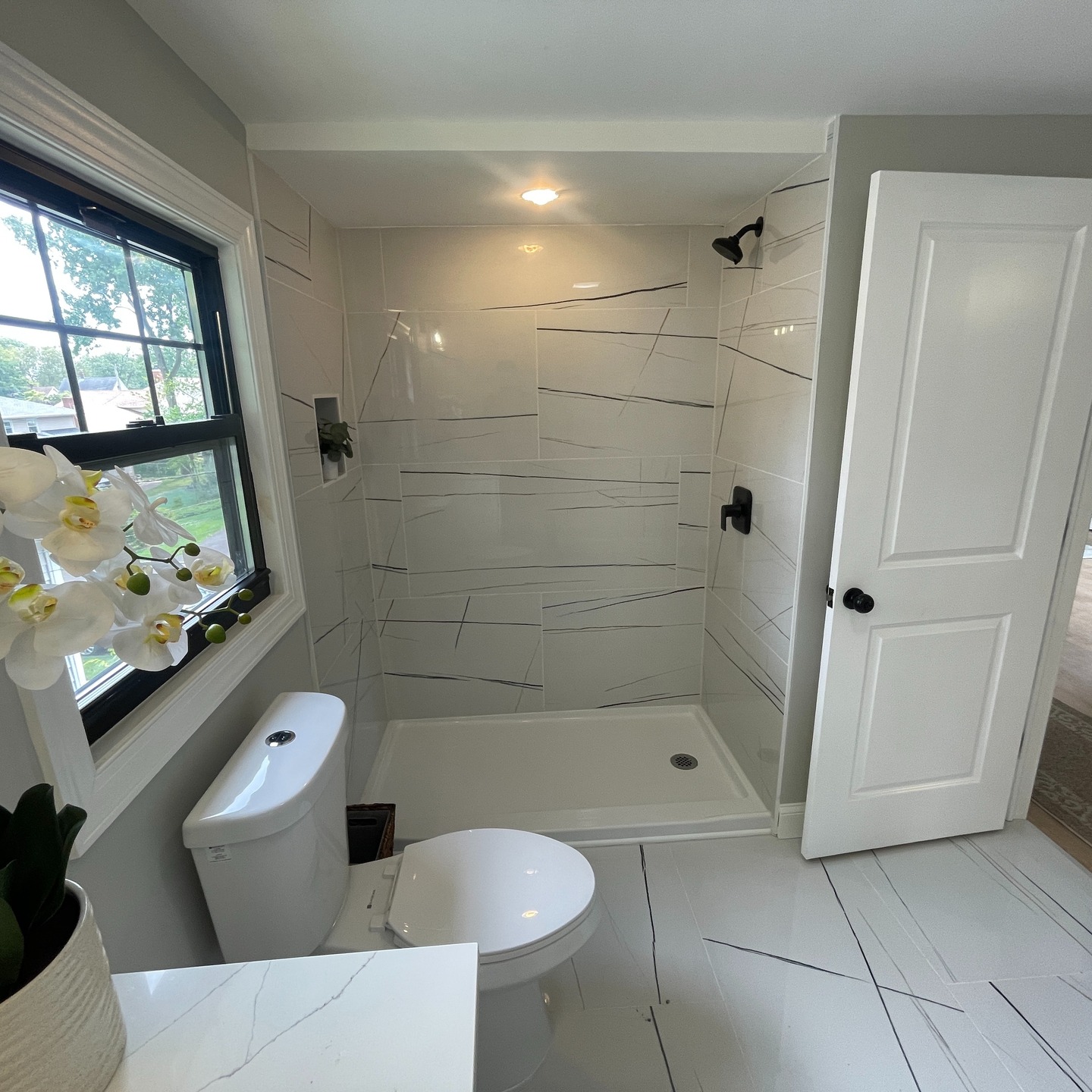 Example tub to walk-in shower conversion